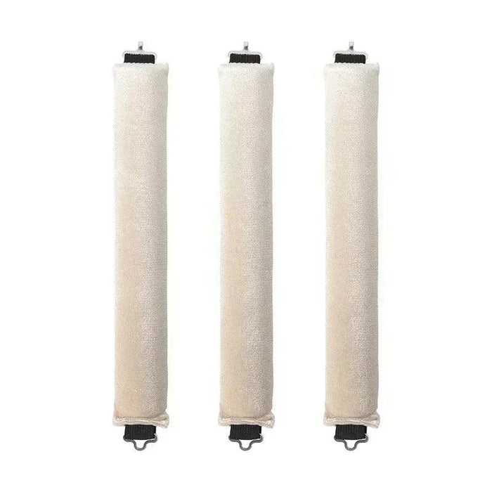 Three beige rod-shaped hair curlers in a row.