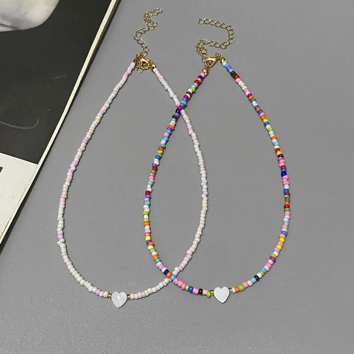 Two Heart Beaded Chokers in white and colorful colors.