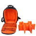 Open empty camera backpack with an orange interior, alongside its removable compartment dividers.