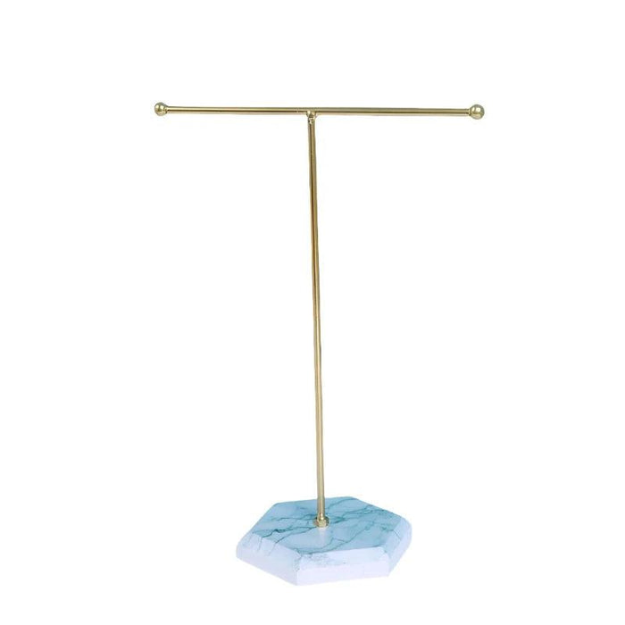 Gold T-Shape Jewelry Holder with white base.