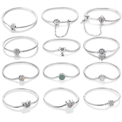 12 different silver bracelets display on white background.