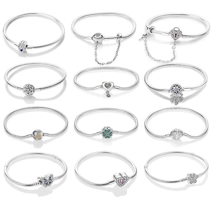 12 different silver bracelets display on white background.