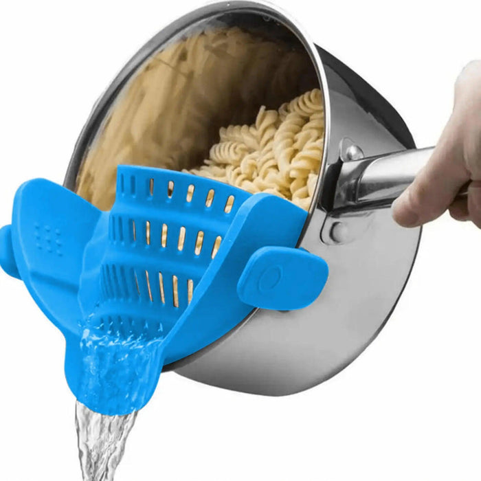 A person pours water from a pot full of pasta with a blue clips that holds the pasta so it doesn't fall and allows the water to escape. Ideal for simple food preparation.