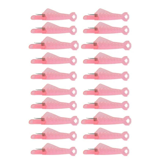 Twenty Fish Mouth Sewing Machine Needle Threaders in pink.