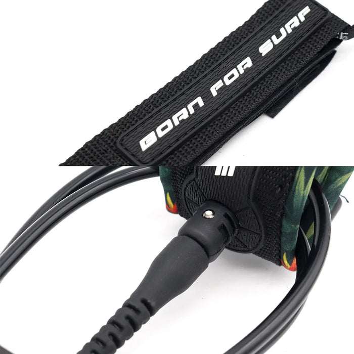 A black surf leash with the phrase "Born for Surf" on the strap.