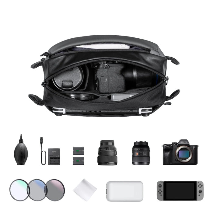 An open K&F Concept camera sling bag filled with camera equipment and accessories, displayed with additional items such as lenses, a camera body, and cleaning tools.