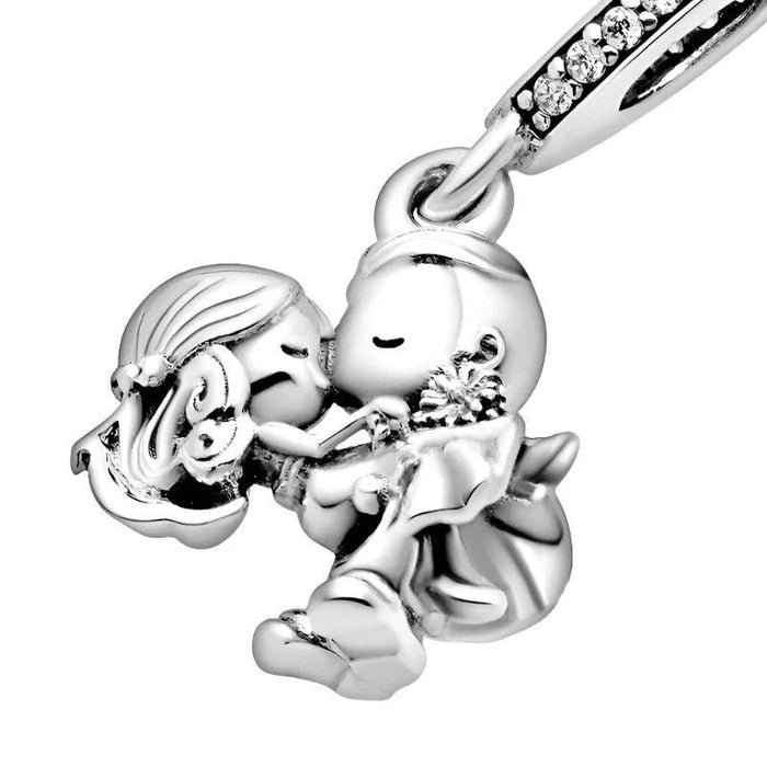 Kissing couple silver charm