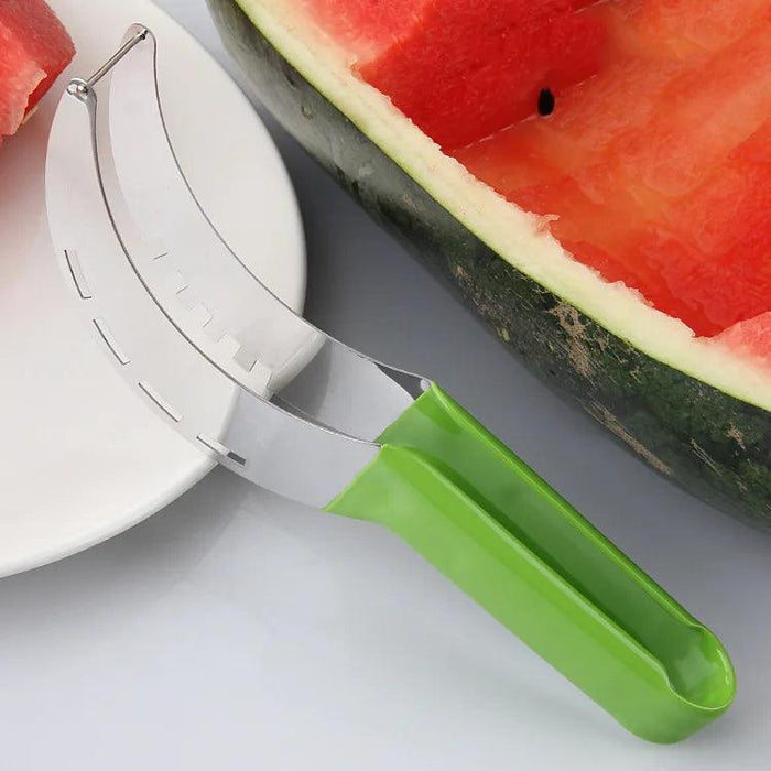 A single watermelon slicer with a green handle is placed next to a watermelon slice, showcasing its simplicity and utility.