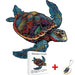 A colorful, detailed wooden puzzle of a sea turtle, accompanied by an A4 size box and a keychain.