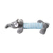 A plush gray elephant  dog toy with a blue and white striped body.