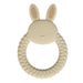 A beige silicone teether shaped like a bunny with textured ears and a round handle.