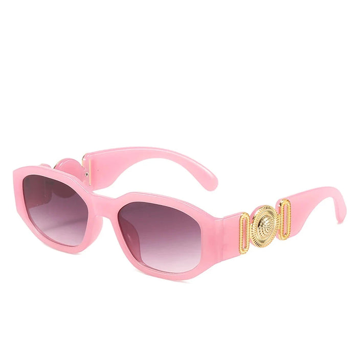 Pink sunglasses with gold accents on the arms, showcasing the full frame and design, displayed on a white background.