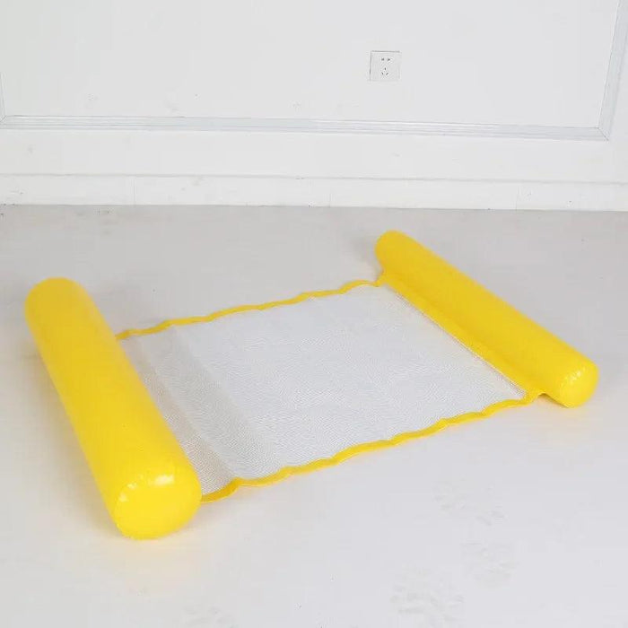 Inflatable yellow pool float with white mesh laid out on the floor.