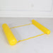 Inflatable yellow pool float with white mesh laid out on the floor.