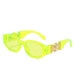 Green sunglasses with gold accents on the arms, showcasing the full frame and design, displayed on a white background.