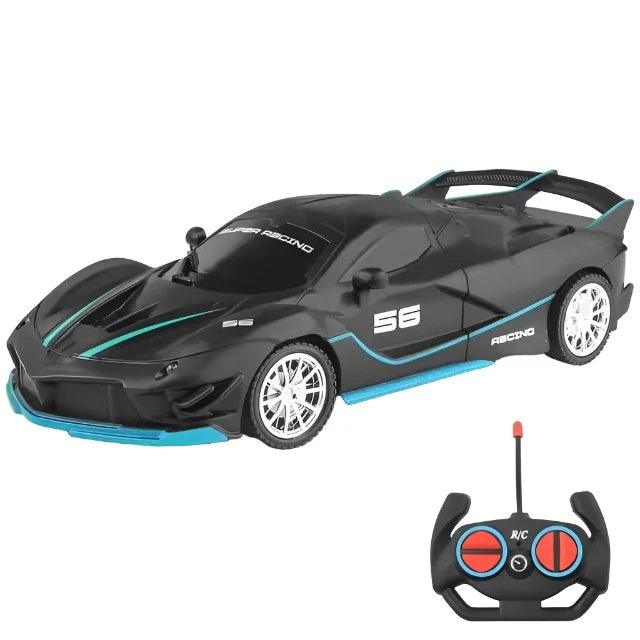 A black sports car with blue accents and an accompanying remote control.