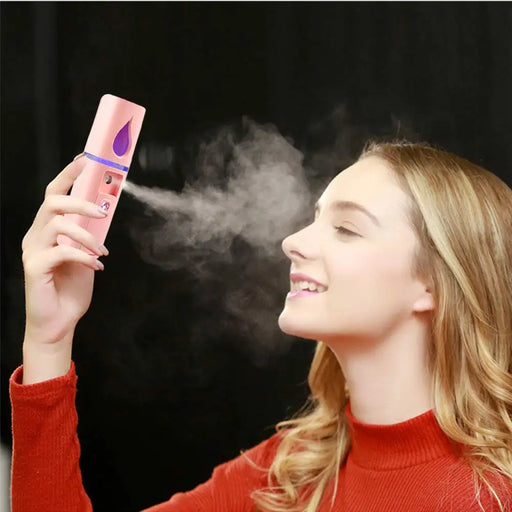 woman using Portable Nano Steamers