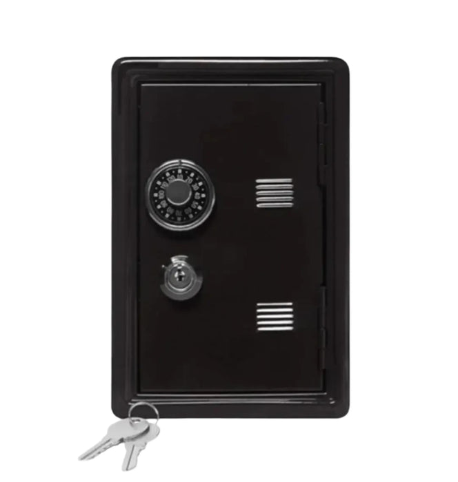 A black metal safe with a combination dial and key lock on the front. The door is closed, and two keys are placed in front of it.