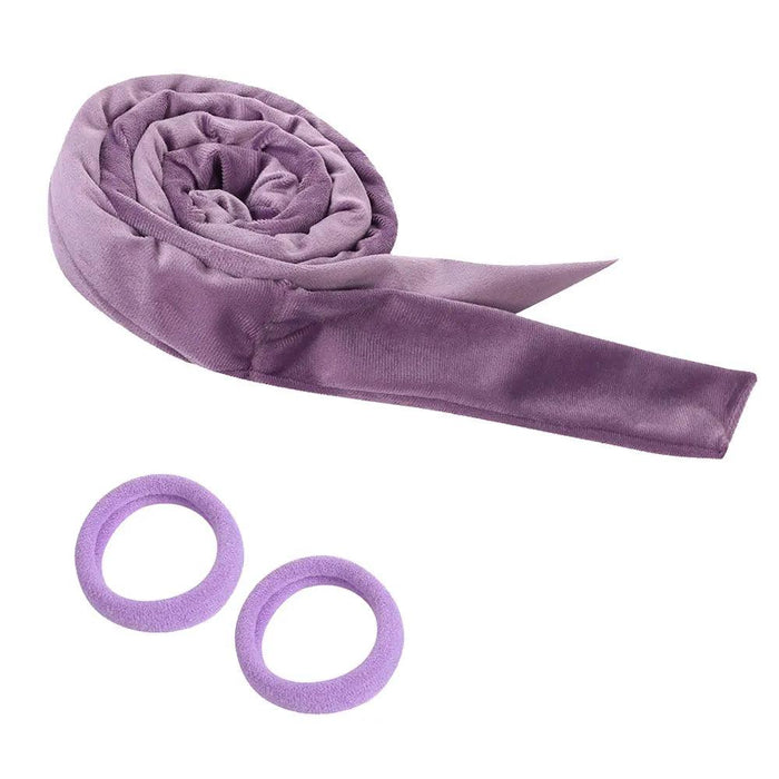 Rolled purple hair curling band with two hair ties.