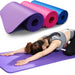 A woman stretches on a purple yoga mat while in the background there are three more yoga mats rolled in colors: beige, pink, and blue. Display on white background.