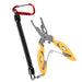 A pair of yellow fishing pliers with a coiled lanyard attached to a red carabiner, designed for easy access and securing the tool.