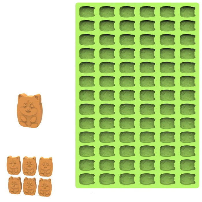 Green cat-shaped silicone mold with brown cat shapes.