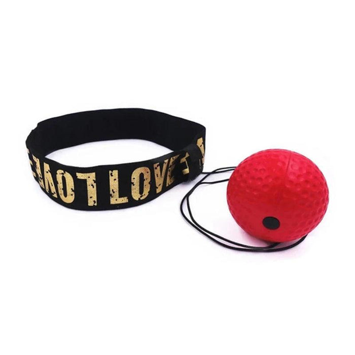 A red boxing reflex ball attached to a black headband, showcasing its design and setup.