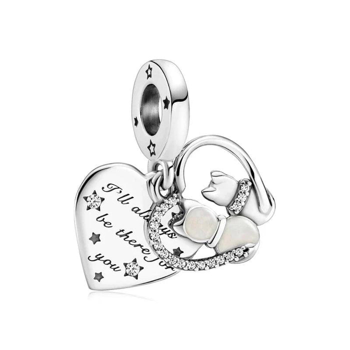 Two cats sitting with back view inside heart silver charm