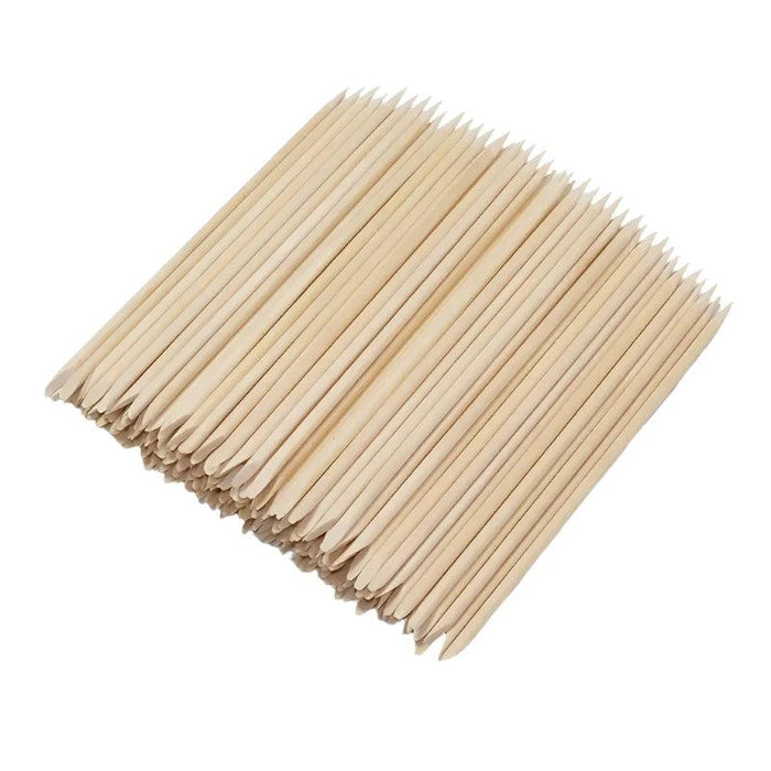 100 pieces of orange wood nail sticks display on white background.