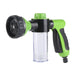 A green and black hose nozzle with a clear soap dispenser, displayed on a white background.