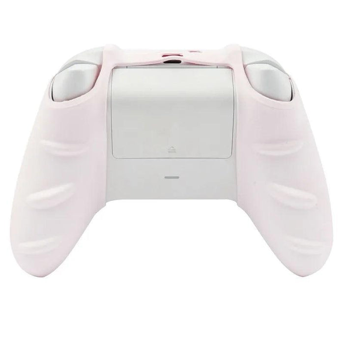 The back view of a white game controller with a light pink grip cover, highlighting the controller's ergonomic design.