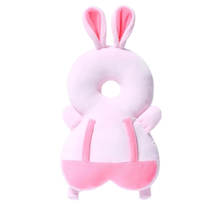 A pink bunny-shaped baby head protector with long ears and a round, soft body.