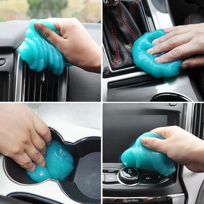 A hand using blue cleaning gel to clean a car's air vent, cup holder, car display screen, and gear stick.