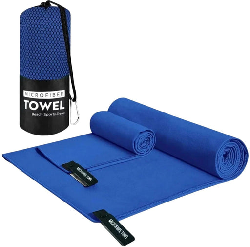 A neatly rolled blue microfiber towel set, including multiple sizes, packaged in a portable mesh bag with a carabiner. The towel is labeled for beach, sports, and travel, indicating its versatility and convenience for various activities.