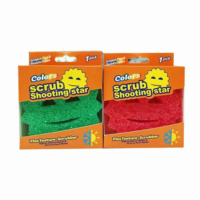 Two packages of the scrub sponges are shown, one with a green sponge and one with a red sponge. The packaging is labeled with the same orange branding, and the sponges' smiling sun design is visible.