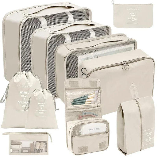 Beige travel organizer set featuring three mesh packing cubes, a drawstring bag, a toiletry bag, a small pouch and a few more bags, all coordinated with the inspirational message 'WISH U HAVE A COLORFUL LIFE'. Ideal for systematic packing and organization. Display on white background.