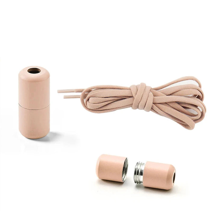 Beige magnetic shoelace closure set with laces and a magnetic lock.