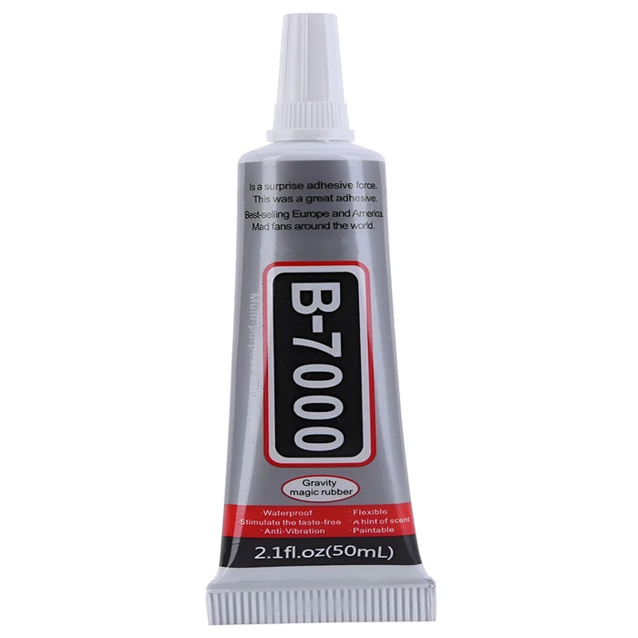 A close-up of a B-7000 adhesive tube, highlighting its label and size.