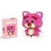 A single block-style toy figure of pink bear, along with its pink packaging box. Display on white background.