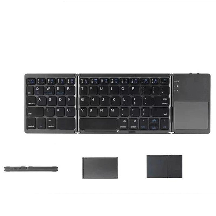 Portable folding keyboard in open and folded positions.