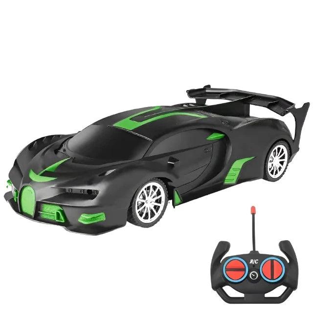  A matte black and green sports car with black accents and an accompanying remote control. The car features a sleek, aerodynamic design and large rear spoiler.