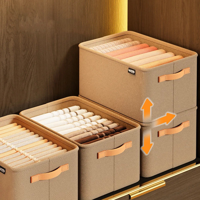 A beige storage organizers stacked on top of each other, filled with neatly rolled items. The organizers have handles for easy carrying and movement.