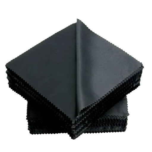 A stack of black microfiber cloth for eyeglasses