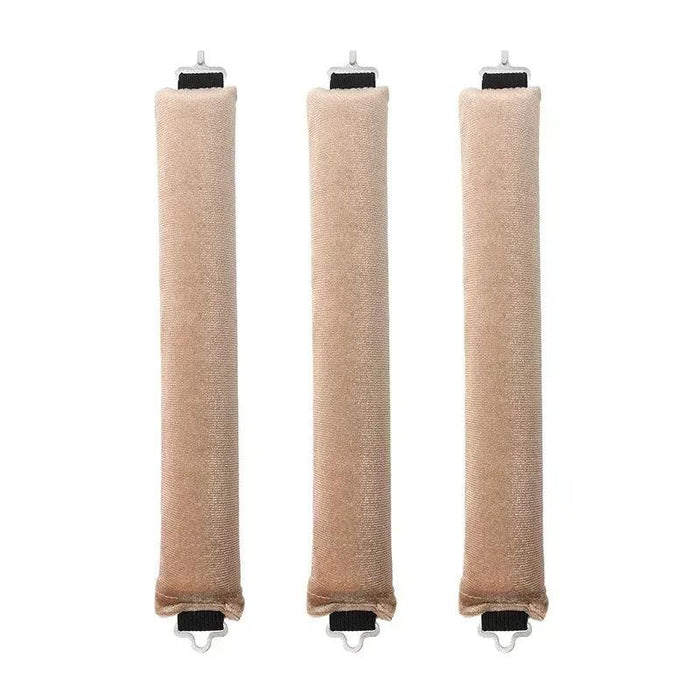 Three khaki rod-shaped hair curlers in a row.