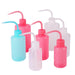 Seven Transparent, blue and pink Plastic Safety Wash Bottles.