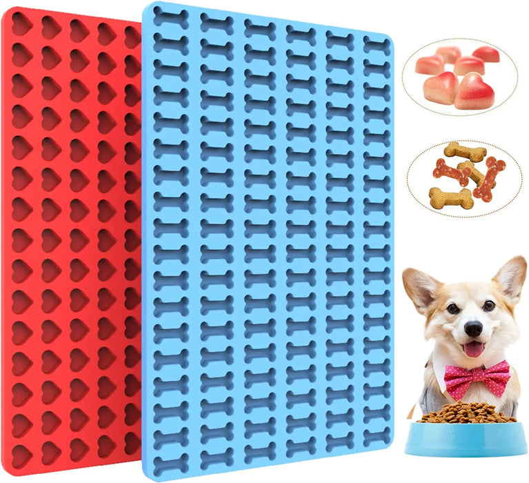 Red and blue silicone molds for dog treats with a dog and treat examples.