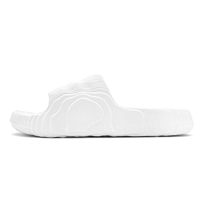 Side view of  white Slide Flip Flops.