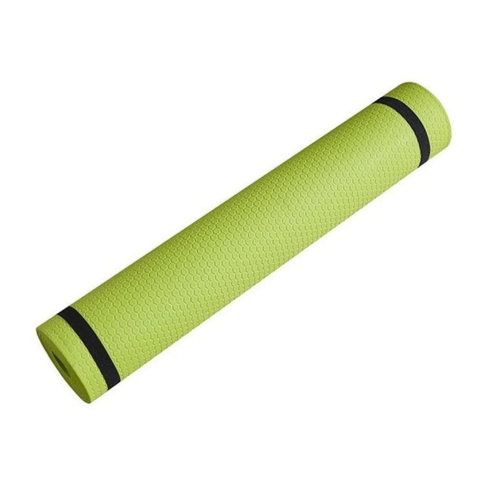 Rolled green yoga mat on a white background.