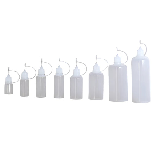 Eight Transparent Squeeze Bottles in different sizes, display on white background.