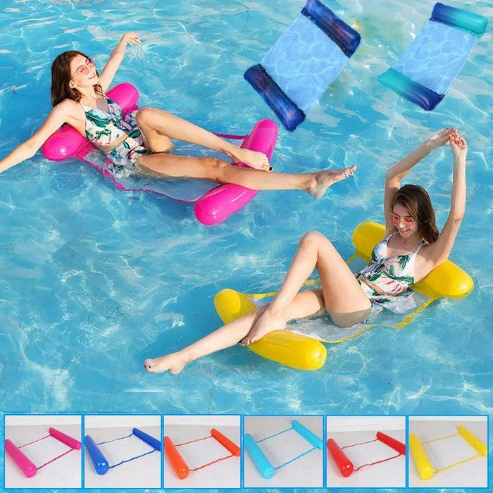 Various colored pool floats (pink, blue, orange, red, yellow) with people using them in the pool.